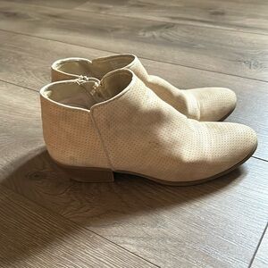 Stylish cream colored ankle boots